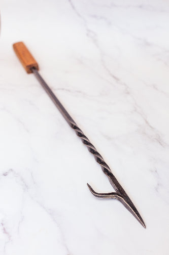 fire poker made from mild steel and a hardwood handle, made by our blacksmith 