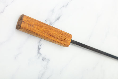 Here is a closeup of our hardwood handles for the fire pokers that we make in our blacksmith workshop 