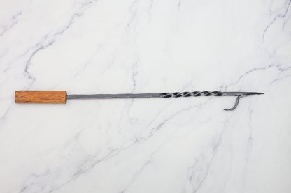 fire poker made by NZ blacksmith. this has a steel spike and a hard wood handle. these are normally 60cm long but can be made to any custom lentgth