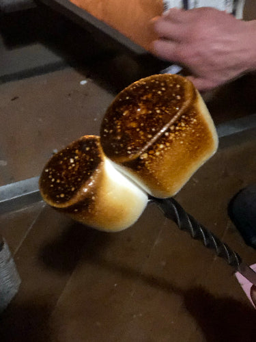 here are some burnt marshmallows on one of our forks in action 