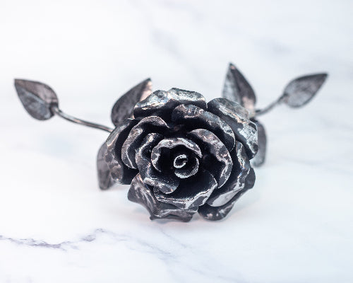 Front view of the Steel Rose, the detail in the steel petals is like nature and hand made by our blacksmith