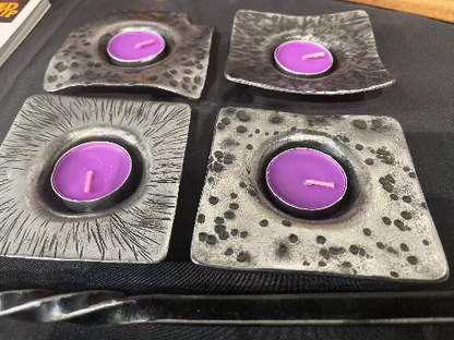 A mixed lot of steel candle holders. thick steel these have real weight to them. made by Blacksmith Justin 